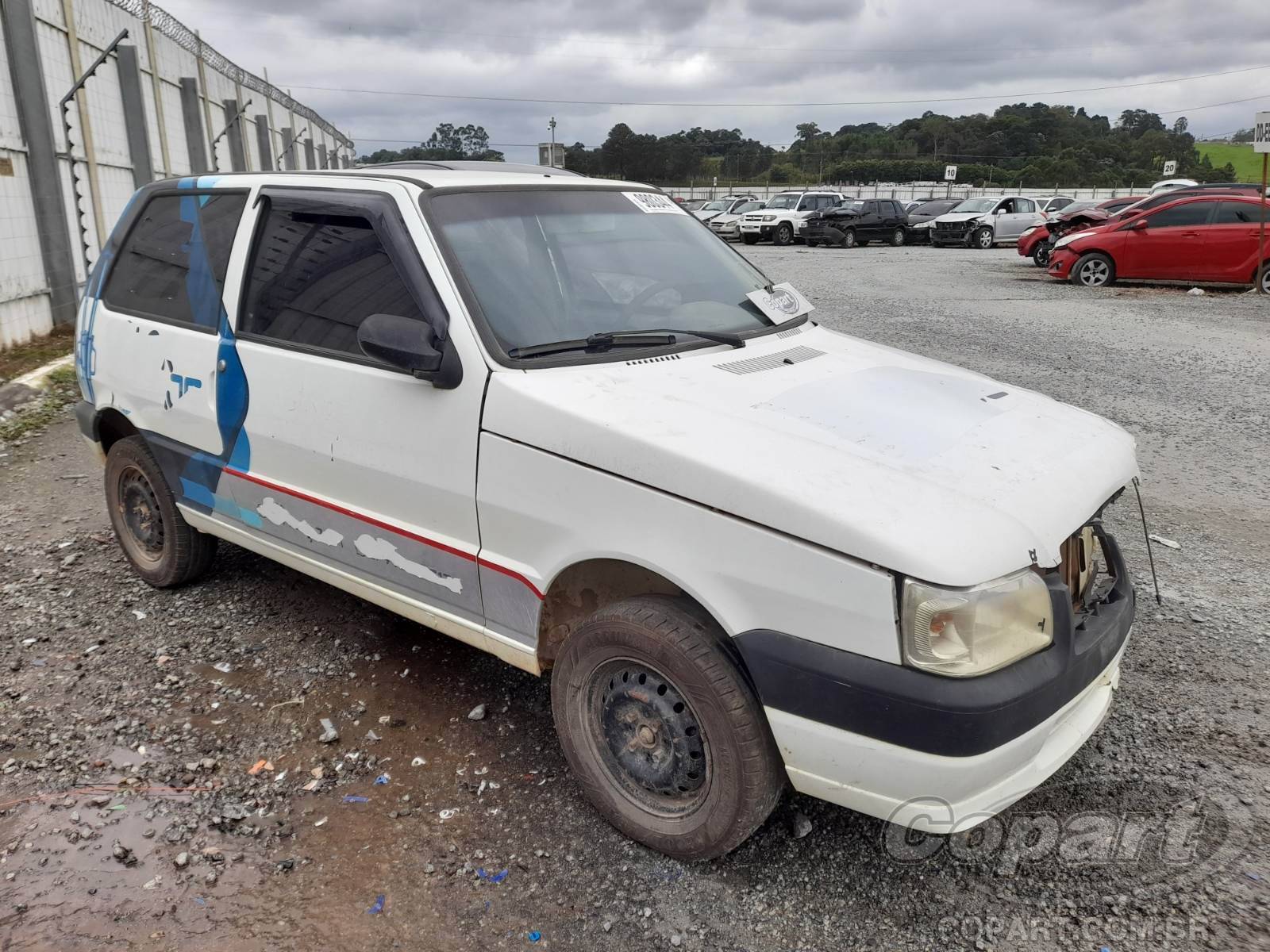 Veículo Fiat Uno Fiat Uno Mille Fire Economy 1.0 2010 Colisão Média Monta 2010 em leilão