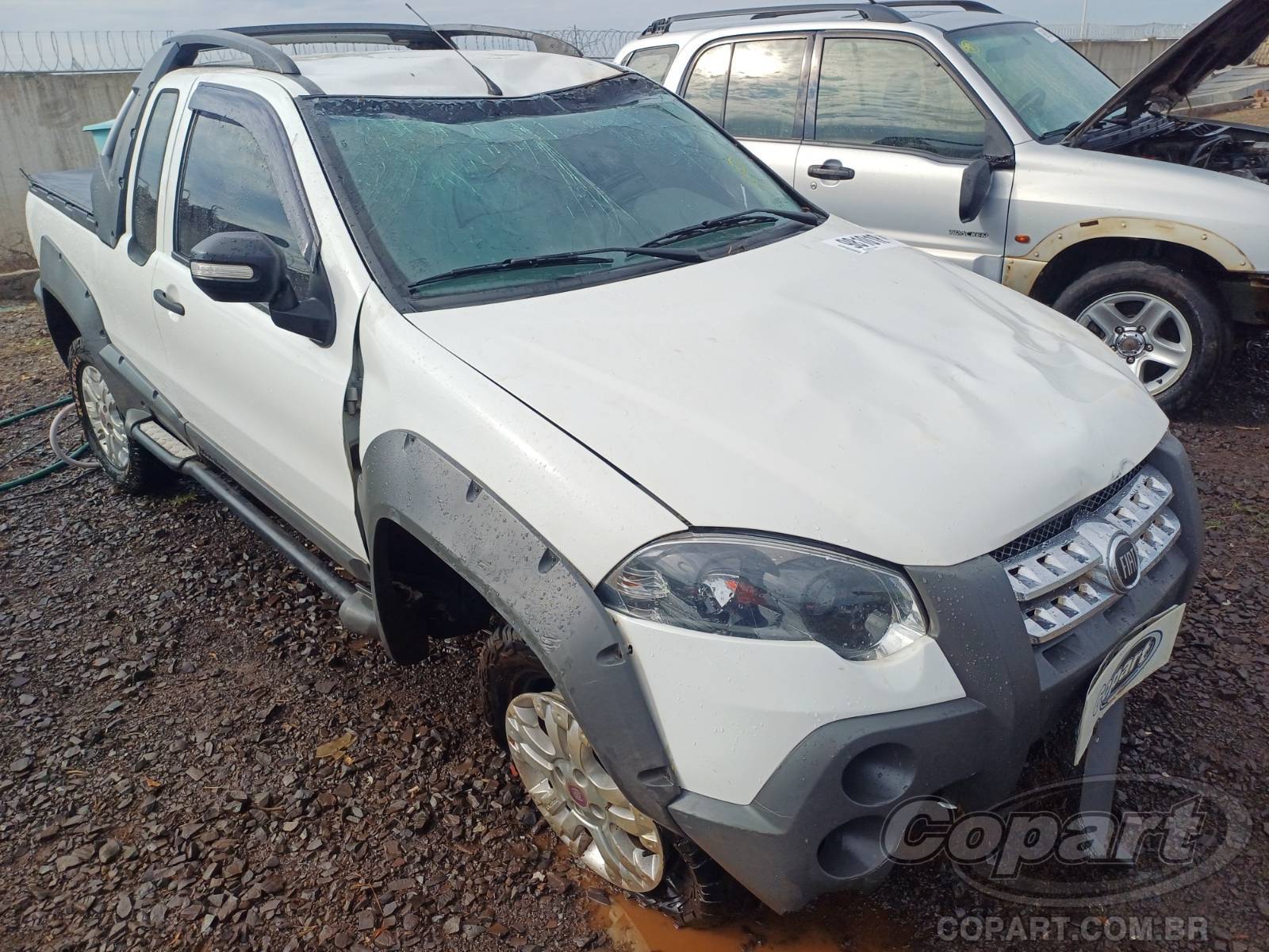 Veículo Fiat Strada Fiat Strada CE Adventure 1.8 16V E.torQ 2012 Médio Estado 2012 em leilão